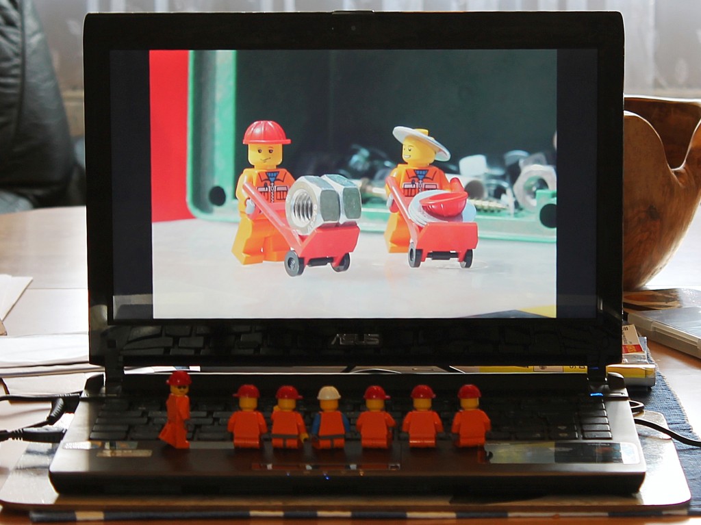 Minifiguren schauen Diashow